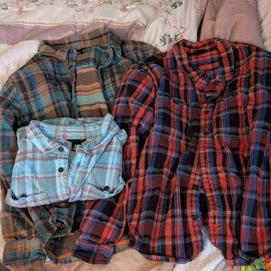 Three Cotopaxi flannel shirts size medium
